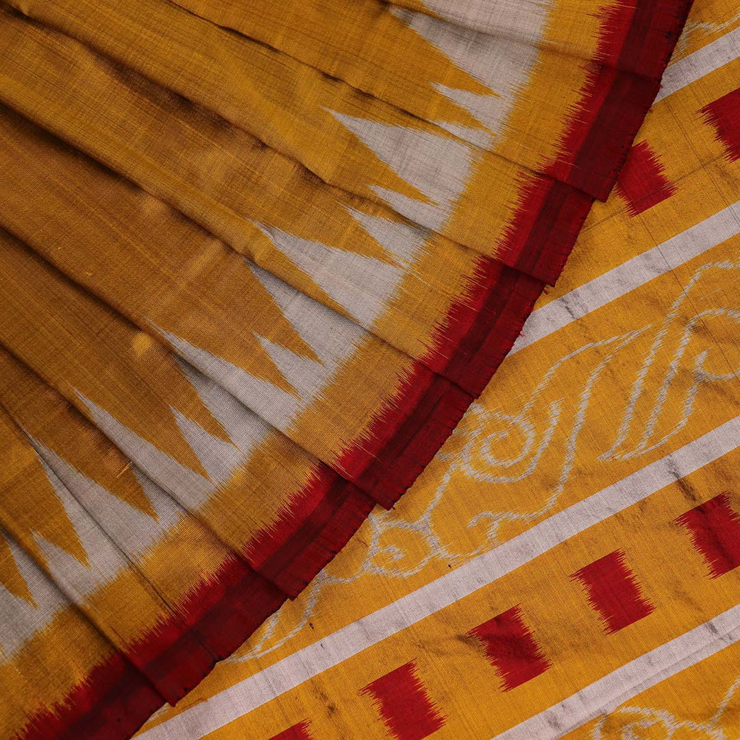 ହ୍ୟାଣ୍ଡଲୁମ୍ ଖଣ୍ଡୁଆ ସିଲ୍କ ଇକାଟ ସାରୀ |