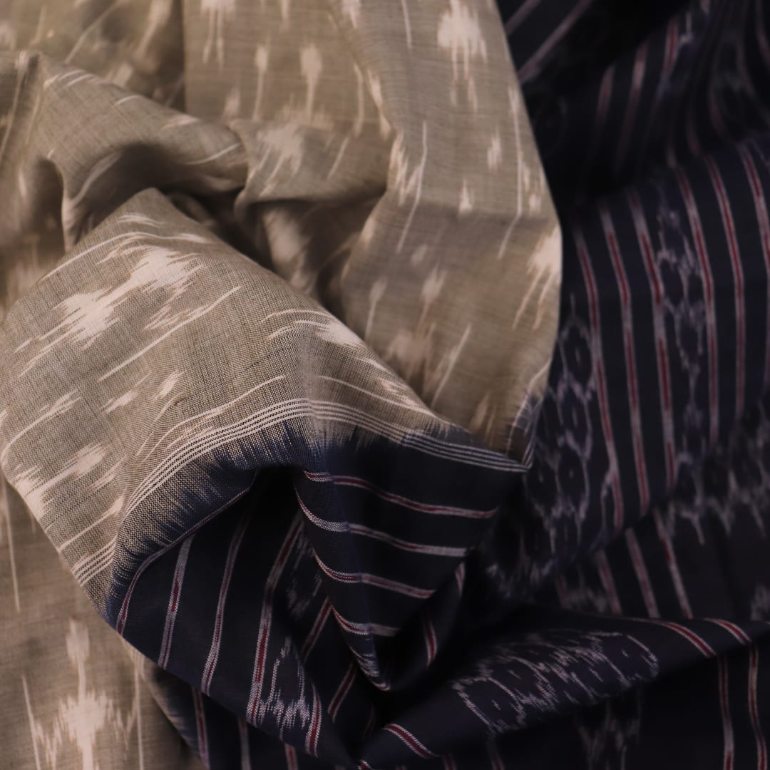 Styled Grey and Black Sambalpuri Cotton Saree with motifs, showcased draped.