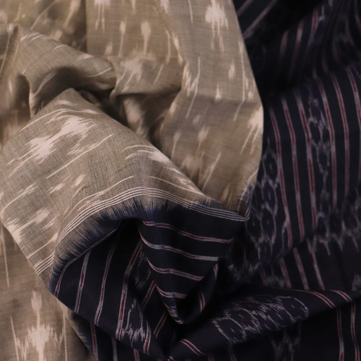 Styled Grey and Black Sambalpuri Cotton Saree with motifs, showcased draped.