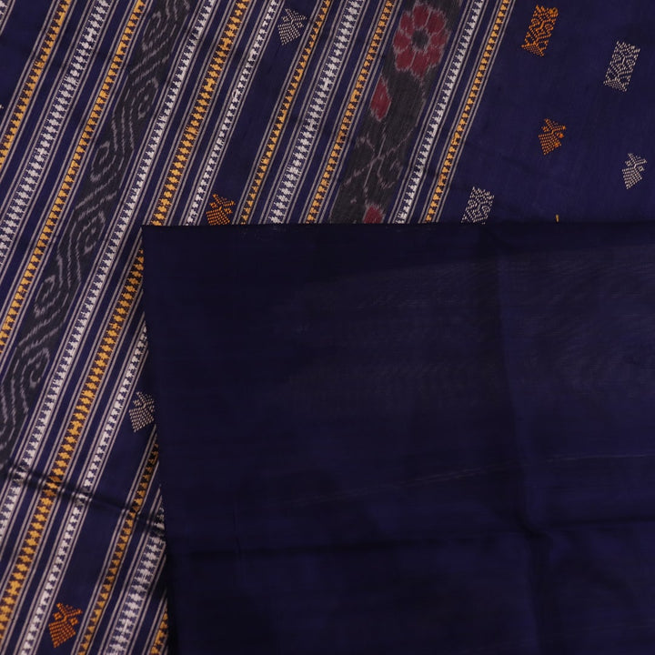 Close-up of white and blue Sambalpuri Silk Saree fabric texture, highlighting butta pattern.