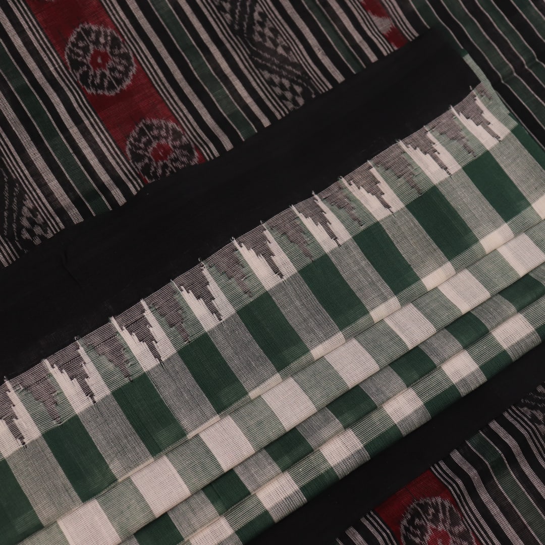 Full view of a green and black Sambalpuri cotton saree with motifs.