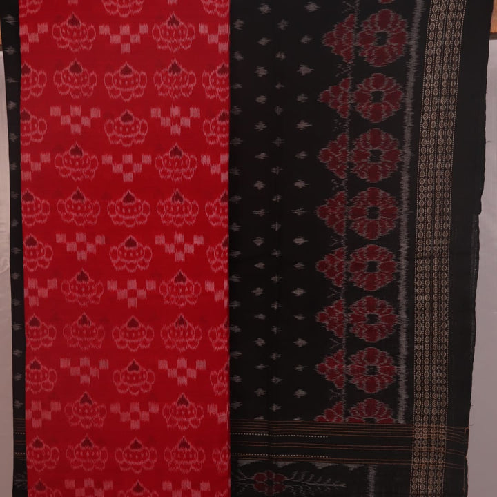 Close-up of the red and black Pasapalli pattern cotton blouse piece for Sambalpuri dress material.