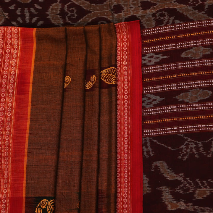 A brown and red Bomkai cotton saree with butta pattern on display