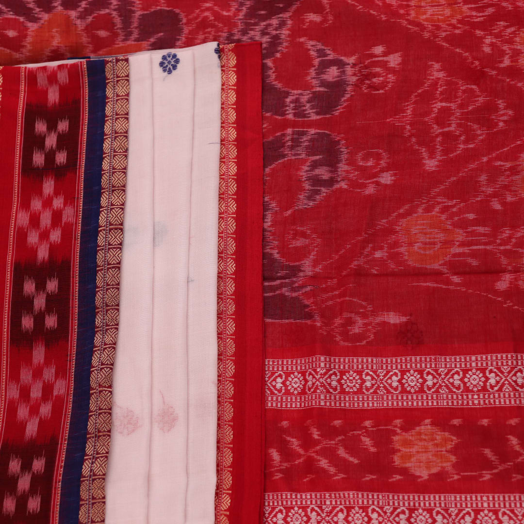 Full view of a white and red Sambalpuri cotton saree with butta pattern.