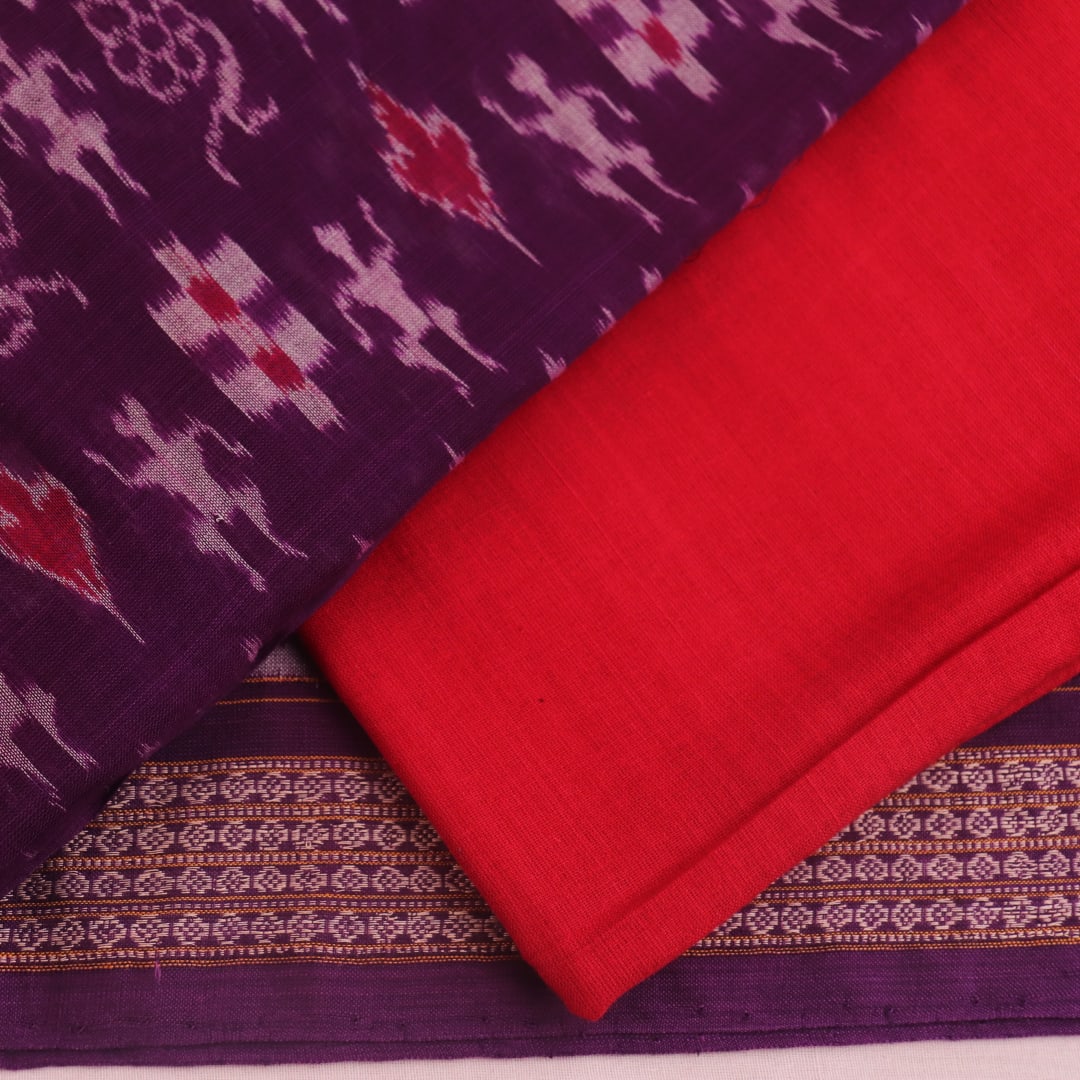 Detail of the violet and red Sambalpuri cotton dress material's blouse piece with motif patterns.