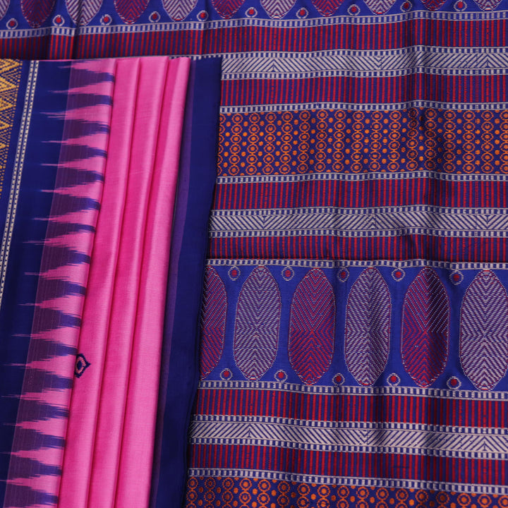 Close-up of pink and blue Dongria Silk Saree fabric texture with butta pattern.