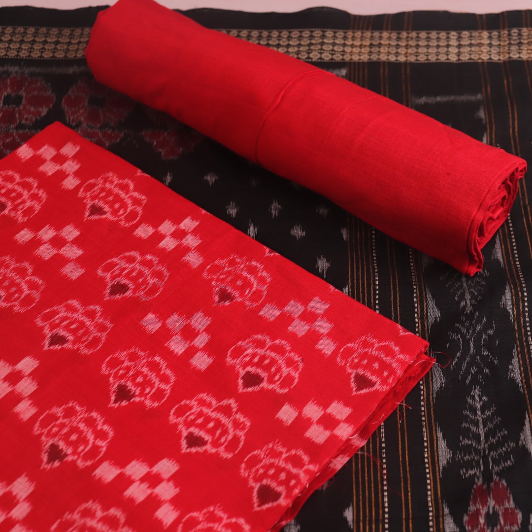 Close-up of the red and black Pasapalli pattern cotton blouse piece for Sambalpuri dress material.