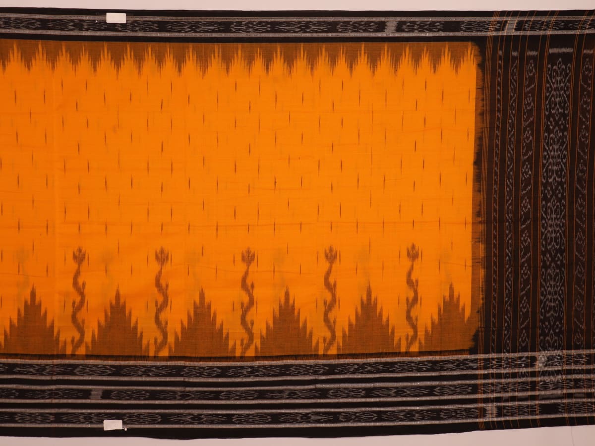 Draped view of a yellow and black Sambalpuri cotton saree with motifs, showcasing its styling and fall.