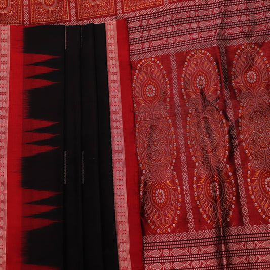 Close-up of black and red silk Sambalpuri saree fabric showcasing intricate motifs