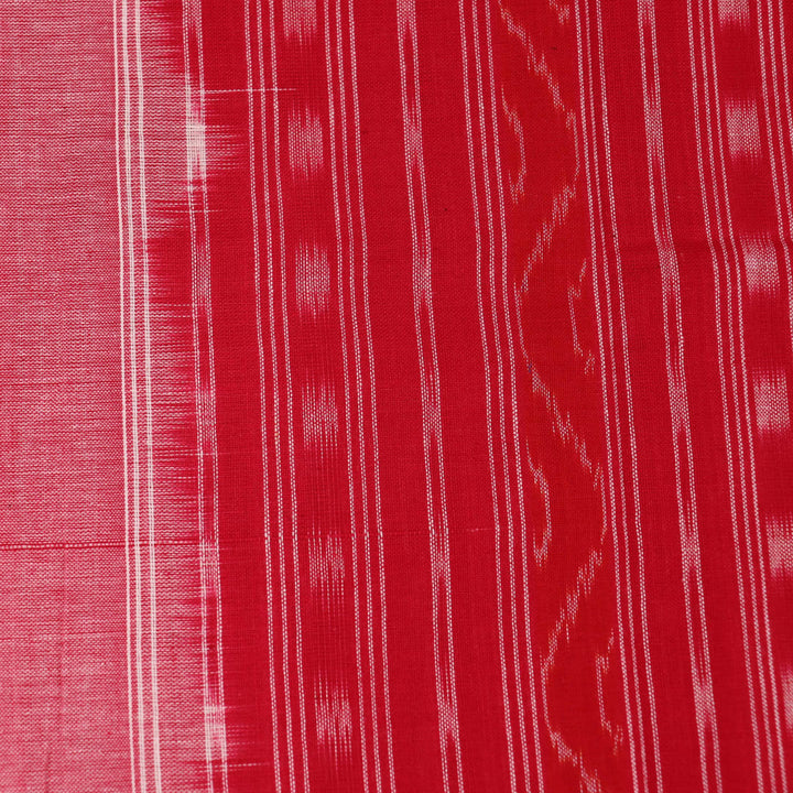 Off-white Sambalpuri cotton dupatta with intricate motifs, styled for a captivating look.