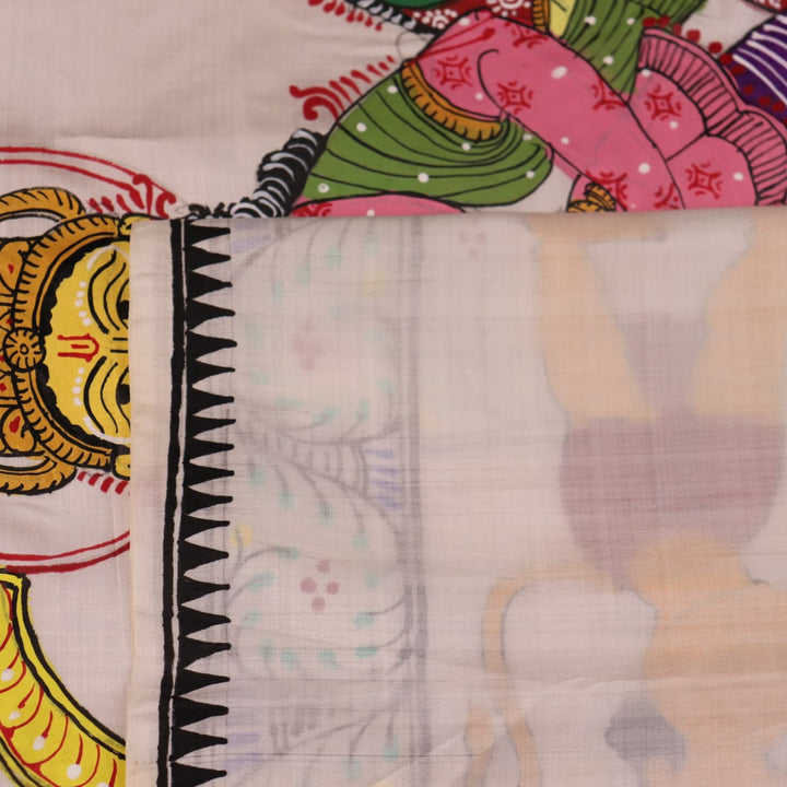 Close-up of handloom white silk Patachitra saree fabric showing texture and hand-painted details.