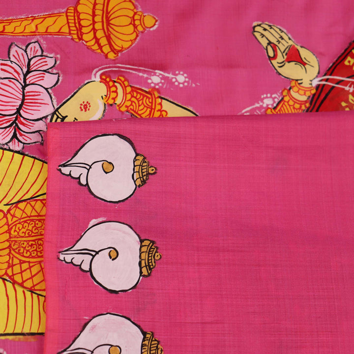 Close-up of pink silk Patachitra saree fabric, showcasing hand-painted texture and fine details.