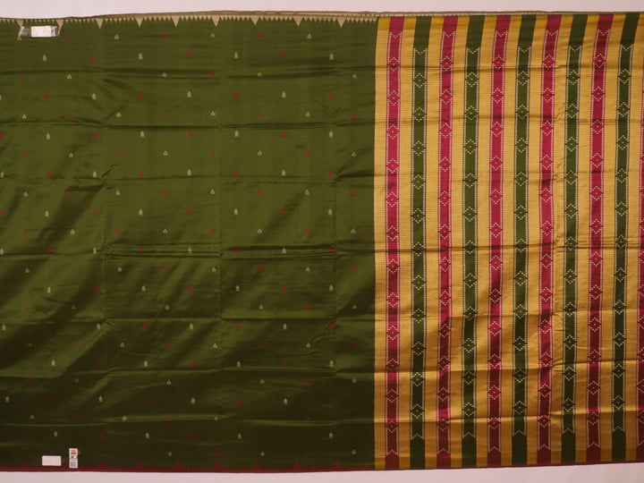 Close-up of the textured green Sambalpuri Silk Saree fabric, highlighting the woven butta pattern.