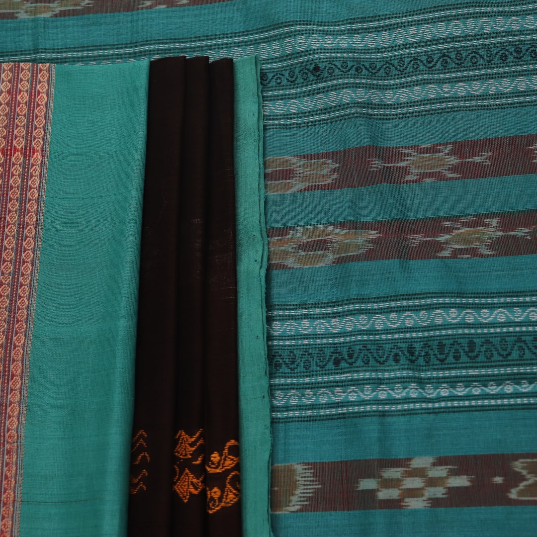 Full view of a brown and green Bomkai cotton saree with Doll pattern.
