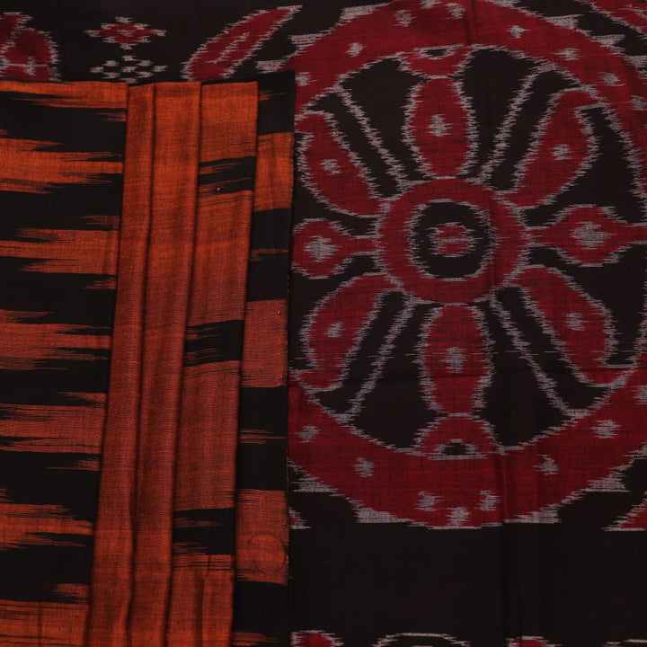 Brown and black plain Sambalpuri cotton saree elegantly draped.