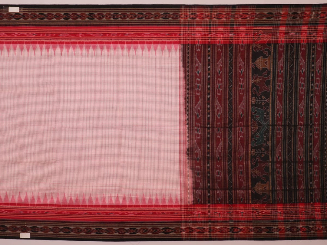 Saree styling: White and black Sambalpuri cotton saree with motifs, draped to showcase the overall look.