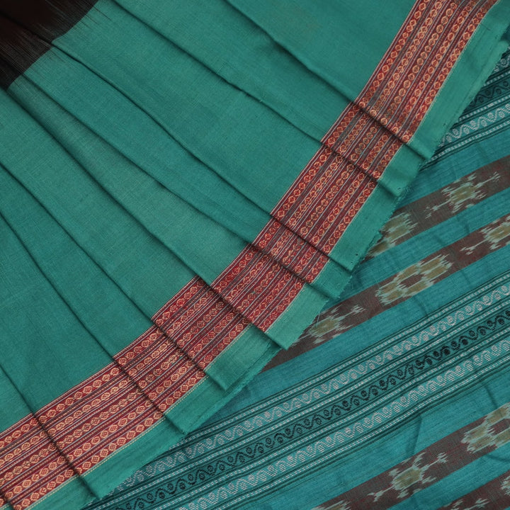 Full view of a brown and green Bomkai cotton saree with Doll pattern.