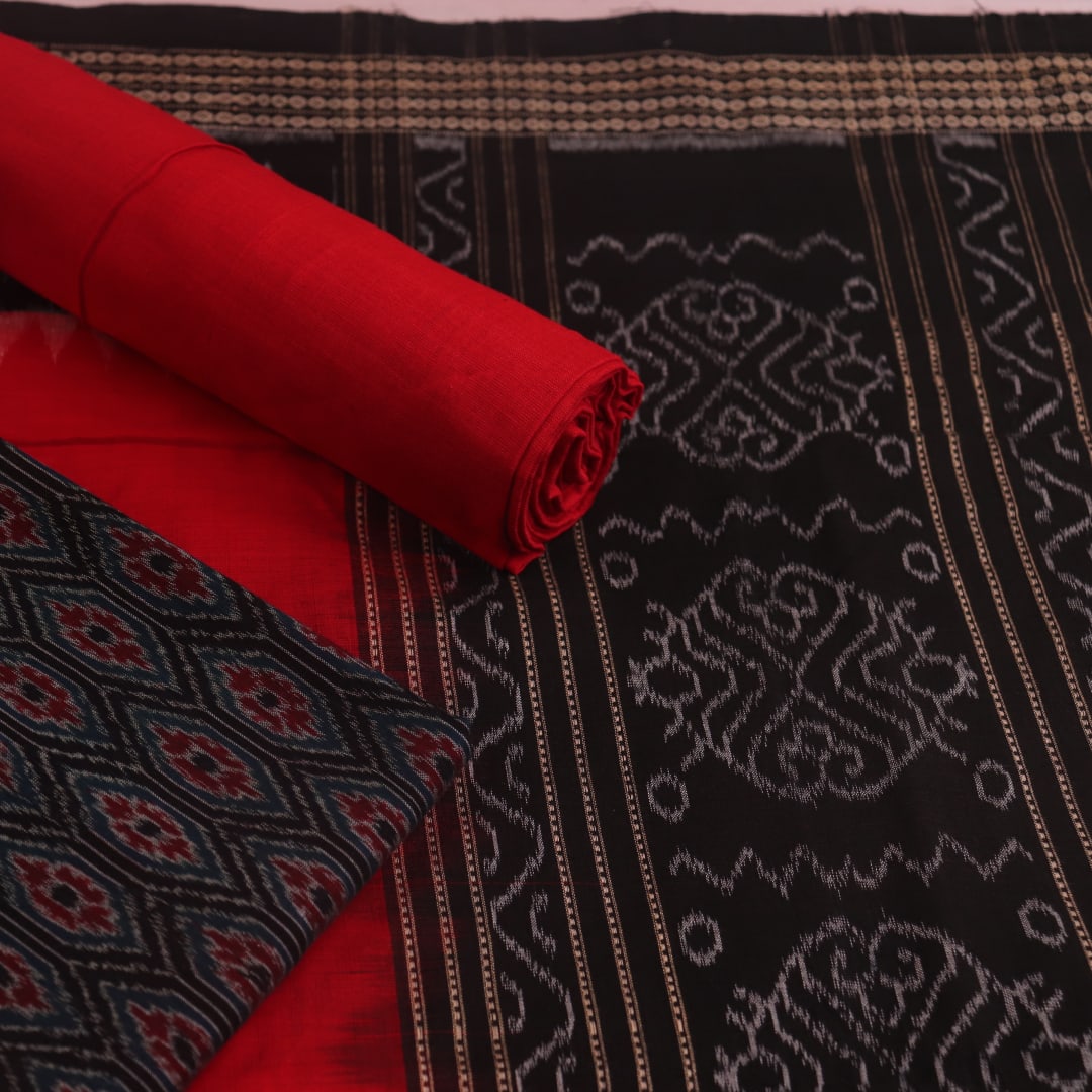 Black and red Sambalpuri cotton blouse piece with motifs.