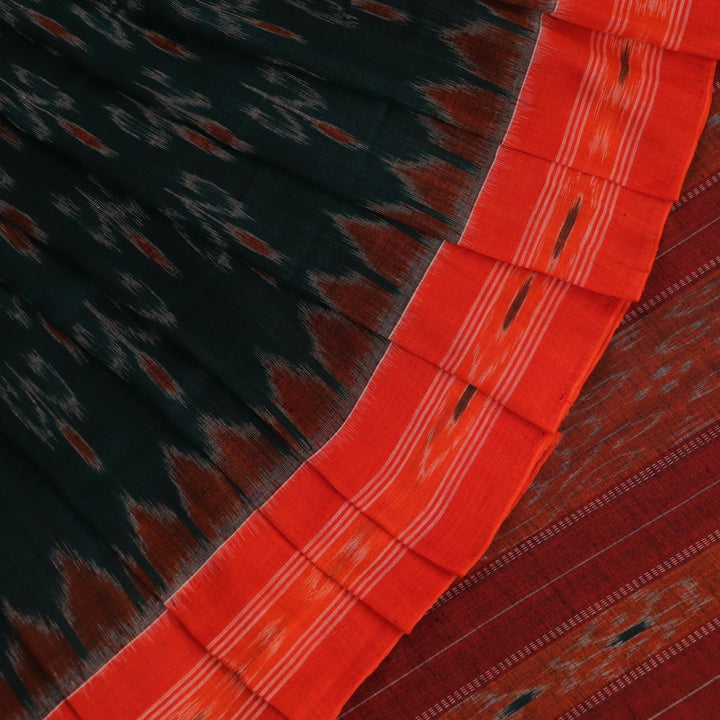 Green and orange Sambalpuri cotton saree draped, showcasing the motif pattern.