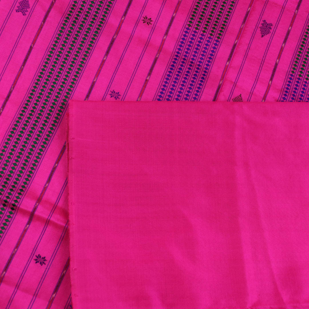 Close-up of plain peach and pink Sambalpuri silk saree fabric texture.