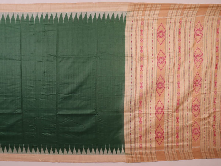 Close-up of the green and off-white plain Tussar silk saree, highlighting its natural slub texture.