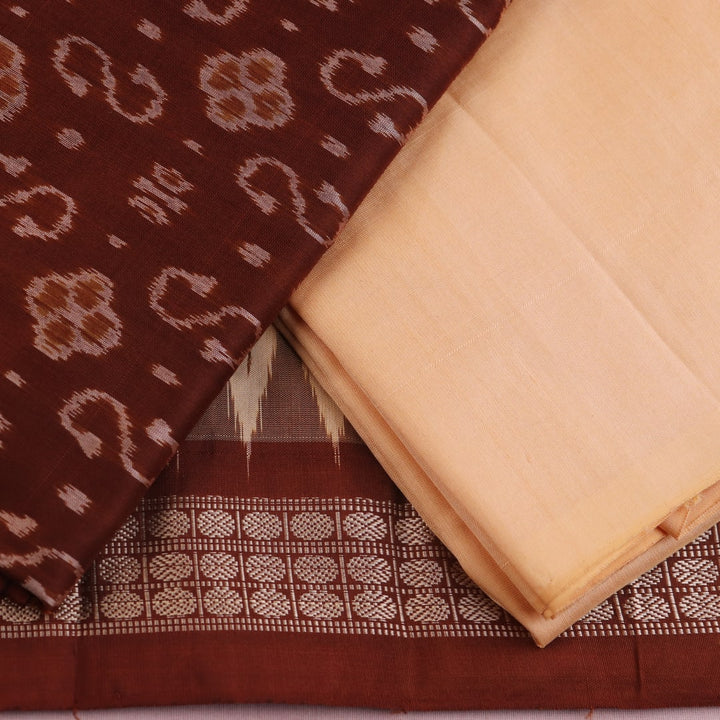 Detail of the brown and cream Sambalpuri silk dress material blouse piece with motifs.