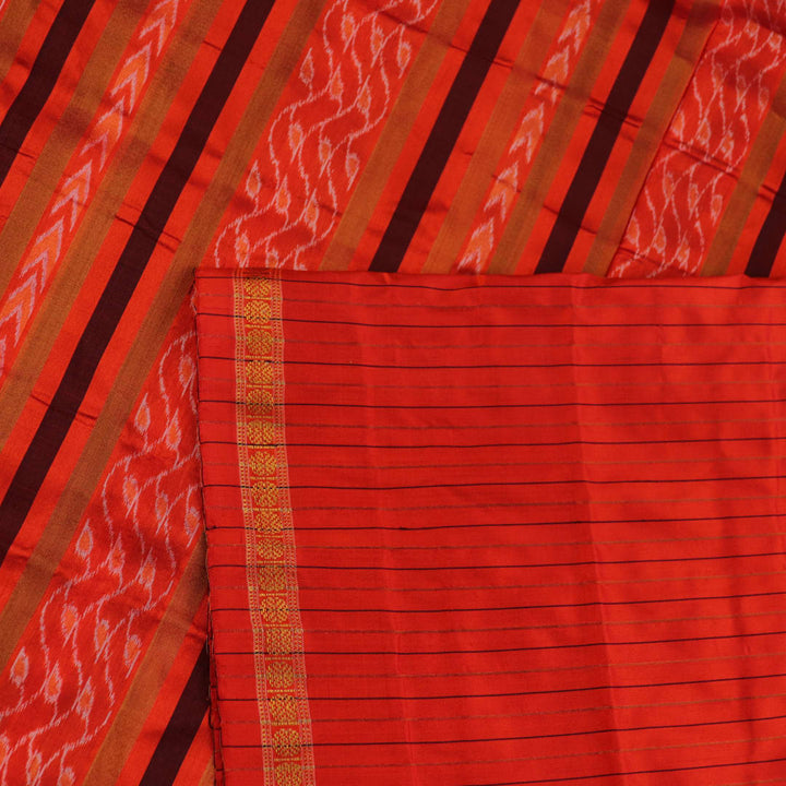 Close-up of multi-color striped Sambalpuri Silk Saree fabric texture.