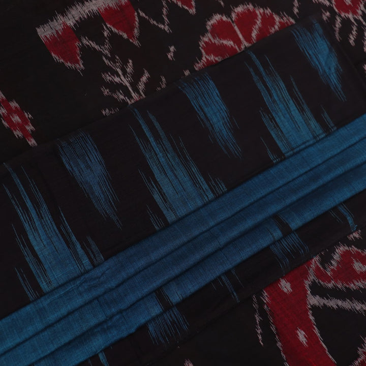 Draped plain blue and black Sambalpuri cotton saree.