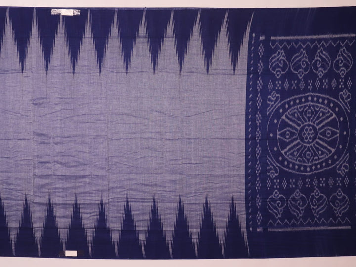 Blue plain Sambalpuri cotton saree styled, highlighting its simple elegance and drape.