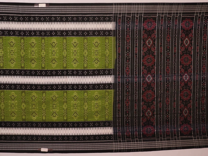 Styled green and black cotton Sambalpuri handloom saree with motifs, showcasing its elegant drape.