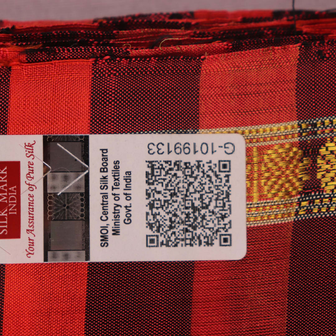 Close-up of multi-color striped Sambalpuri Silk Saree fabric texture.