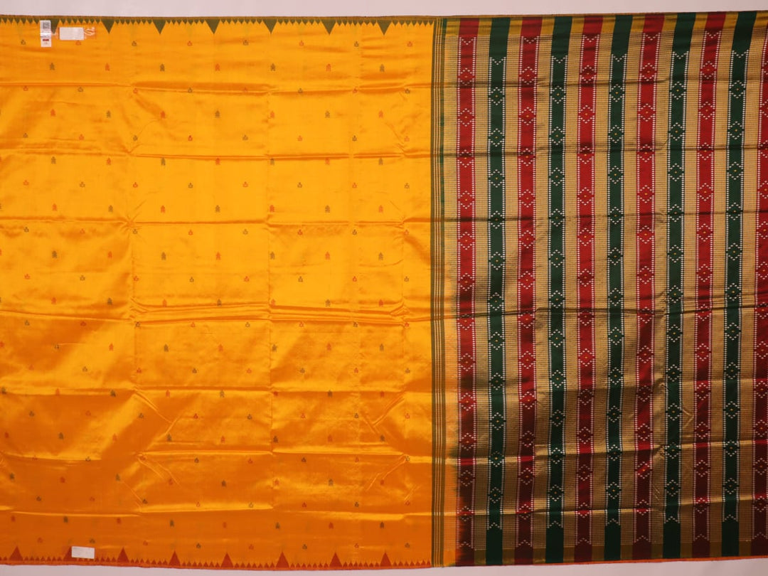 Close-up of yellow & green Sambalpuri Silk Saree fabric texture, showing Butta pattern.