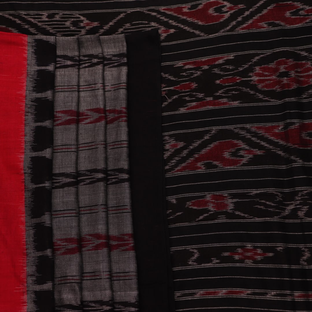 Grey and black Sambalpuri cotton saree draped, showcasing overall look and handloom texture.