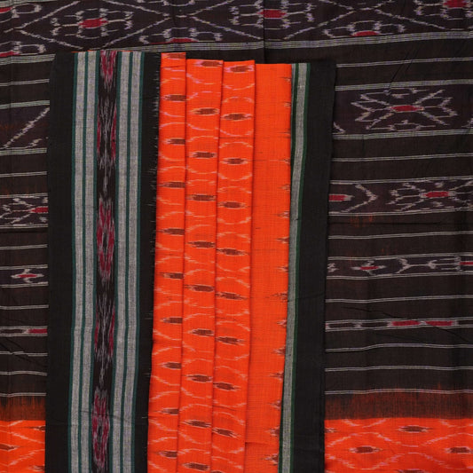 Model wearing an orange and black Sambalpuri cotton saree, styled in an elegant traditional drape.