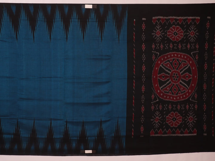 Draped plain blue and black Sambalpuri cotton saree.