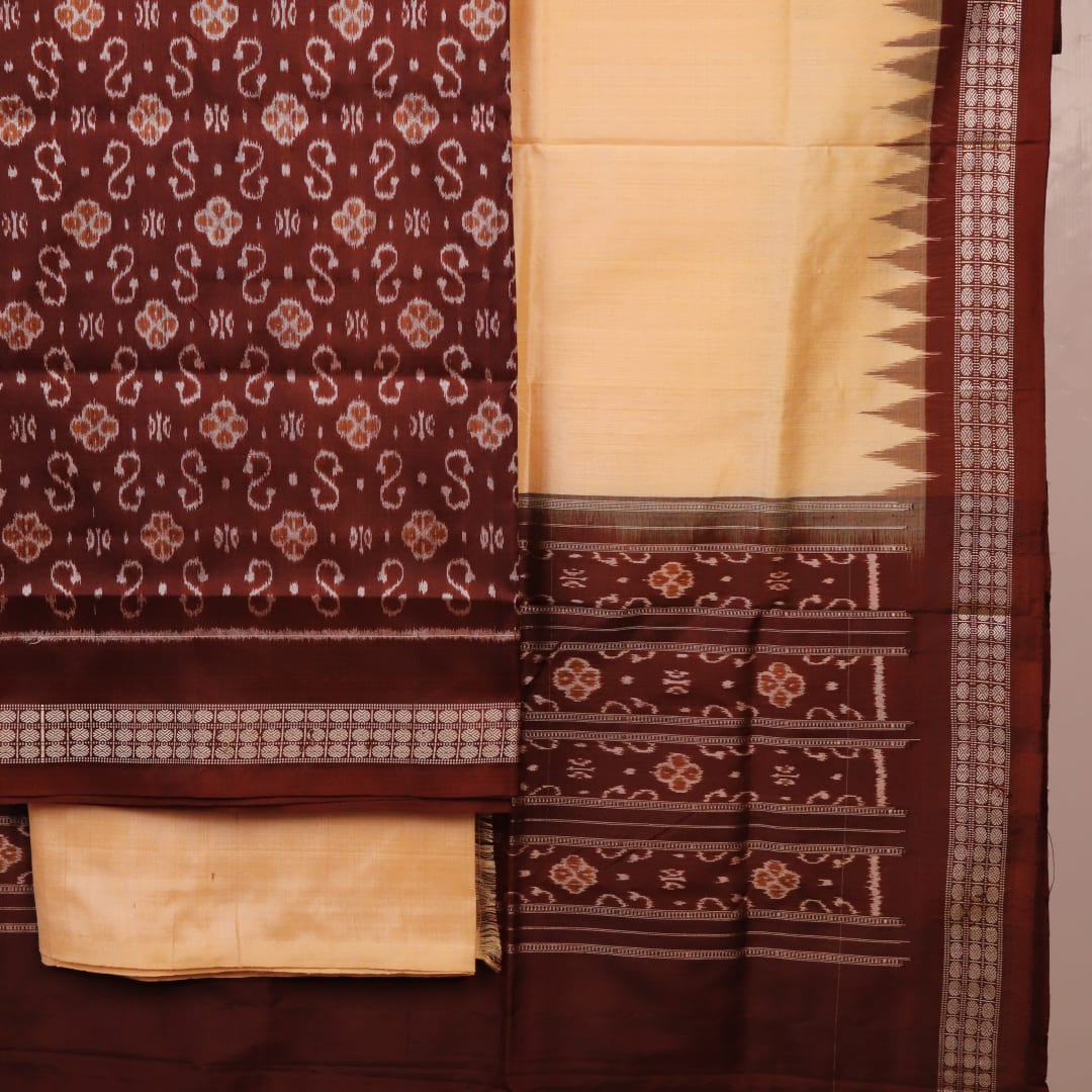 Detail of the brown and cream Sambalpuri silk dress material blouse piece with motifs.