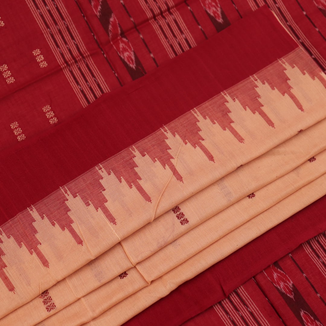 Full view of a cream and maroon Sambalpuri cotton saree with butta pattern.