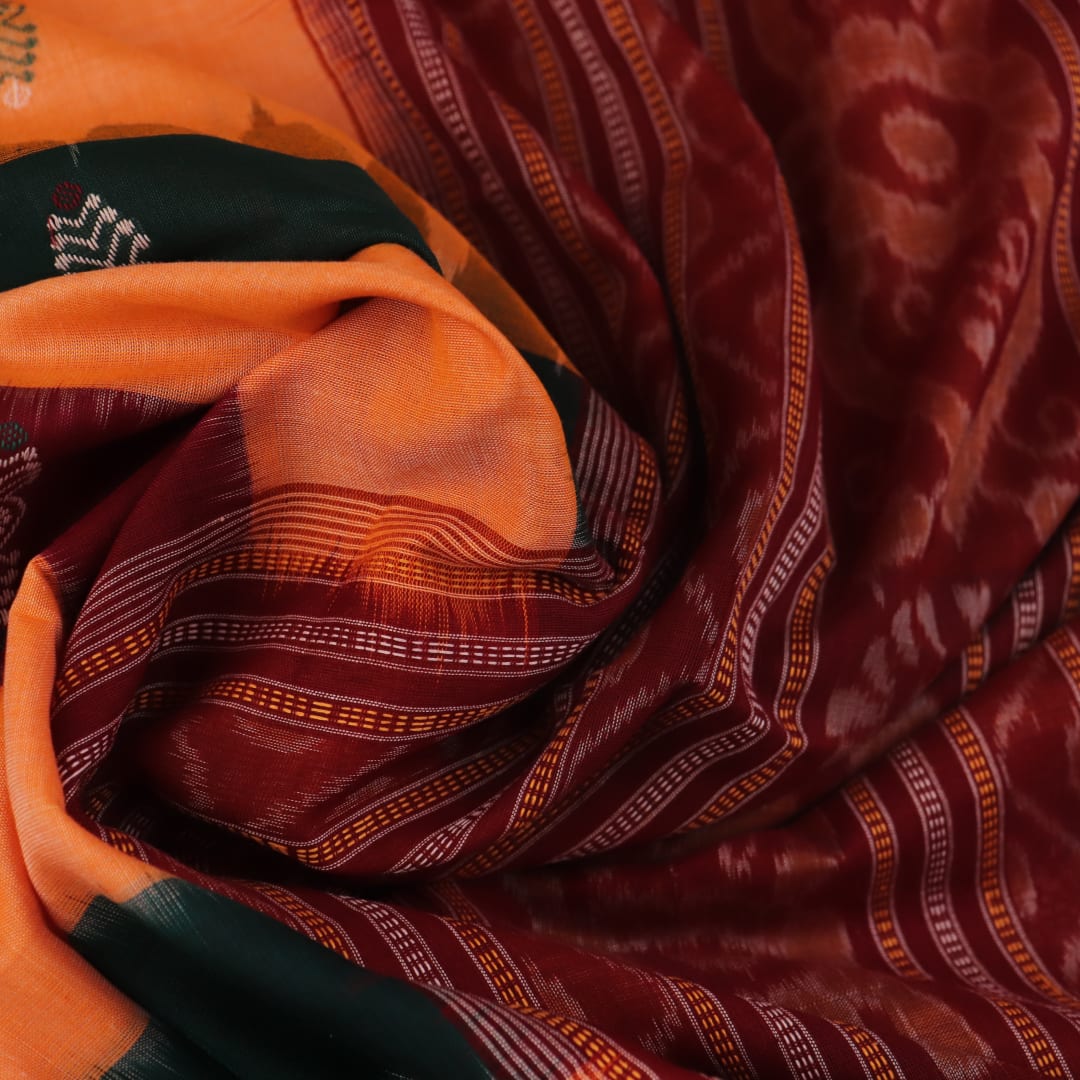 Full view of a yellow and maroon Bomkai cotton saree with butta pattern.
