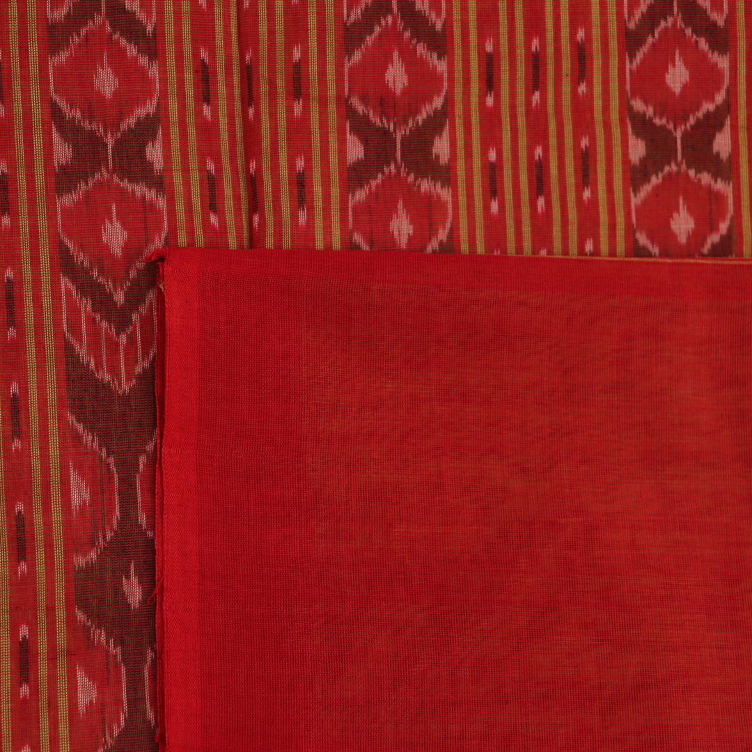 Full view of a plain green and red handloom Sambalpuri cotton saree.