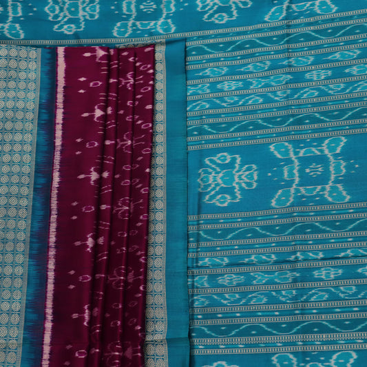 Close-up showcasing the purple and blue silk fabric texture of the Sambalpuri saree with intricate motifs.