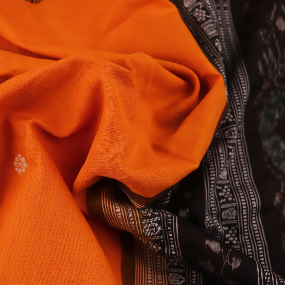 Full view of a yellow and black Sambalpuri cotton saree with butta pattern.