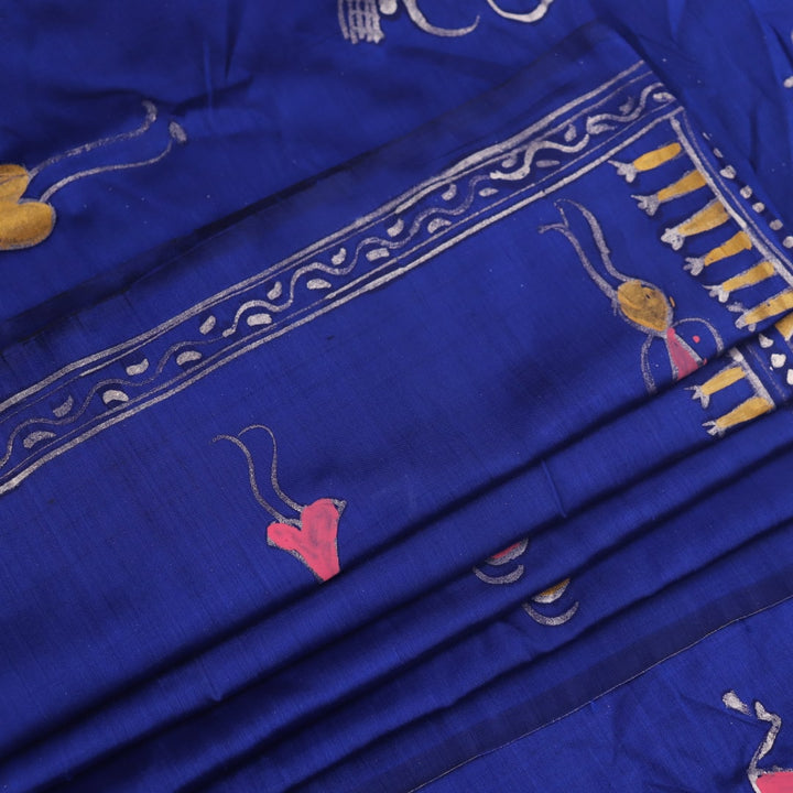 Close-up of handloom blue silk Patachitra saree, showcasing the detailed texture of the hand-painted fabric.