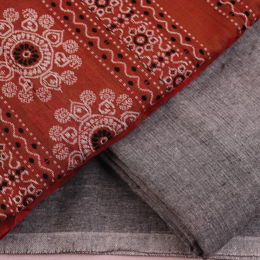 Coordinating Bomkai Cotton blouse piece detail, showcasing subtle multi-color patterns on a grey fabric.