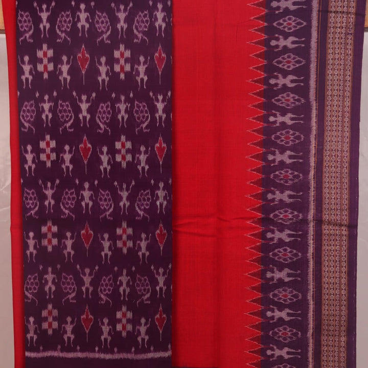 Detail of the violet and red Sambalpuri cotton dress material's blouse piece with motif patterns.