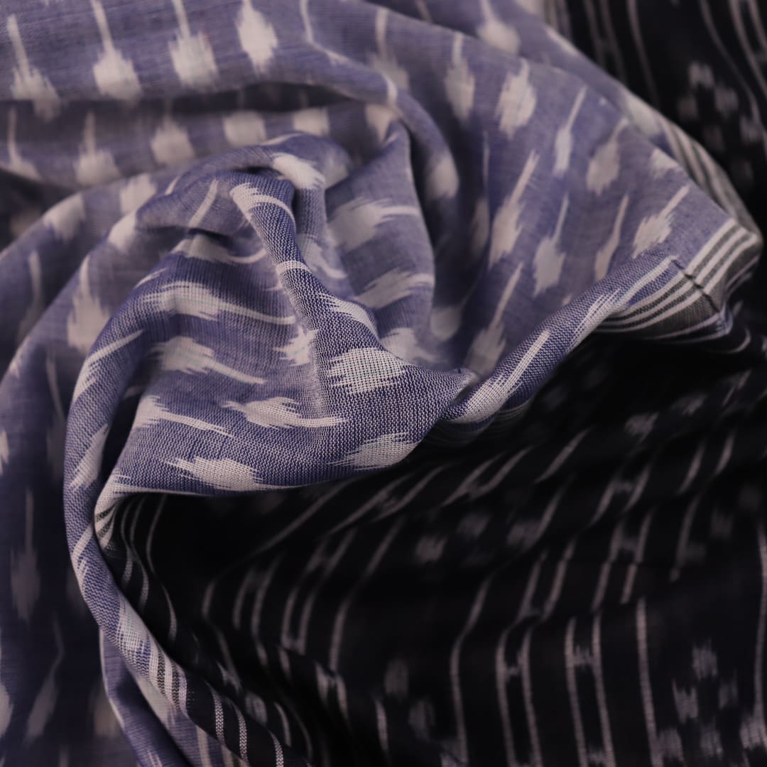 Elegantly styled and draped grey and black Sambalpuri cotton saree with motifs.