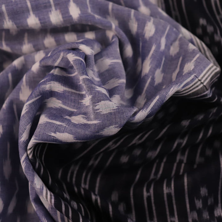 Elegantly styled and draped grey and black Sambalpuri cotton saree with motifs.