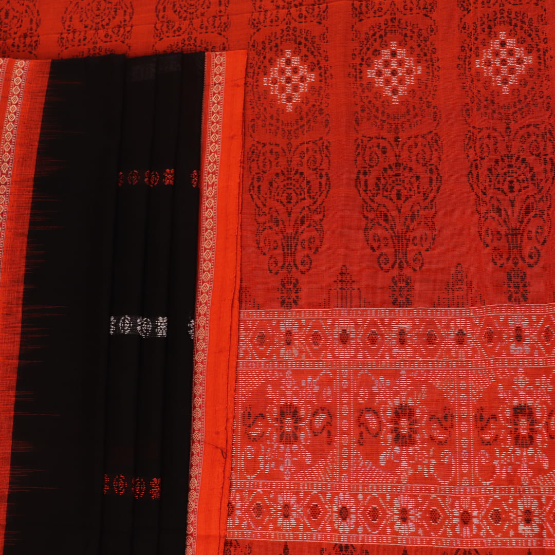 Full view of a black and orange Bomkai cotton handloom saree with butta pattern.