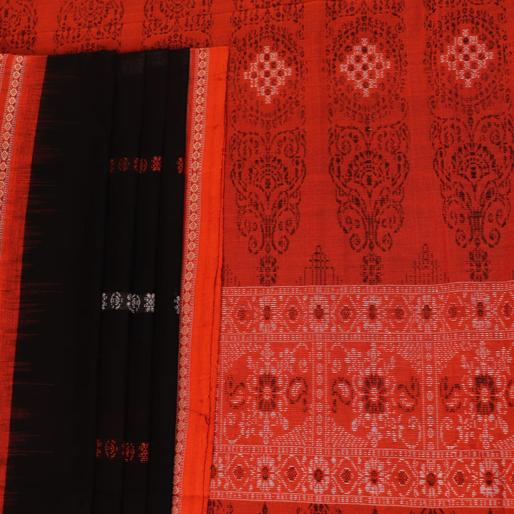 Full view of a black and orange Bomkai cotton handloom saree with butta pattern.