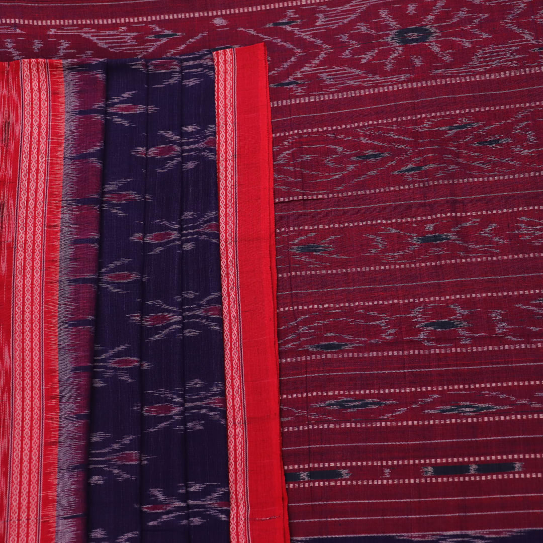 Blue Sambalpuri cotton saree draped, showcasing the overall styling and motifs.