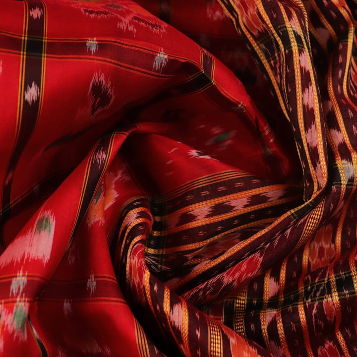 Red and black silk Khandua saree with Nabakothi pattern, styled or draped view showing the overall look.